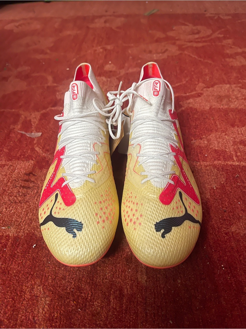 Puma Future Match FG AG White and Pink Soccer Cleats.